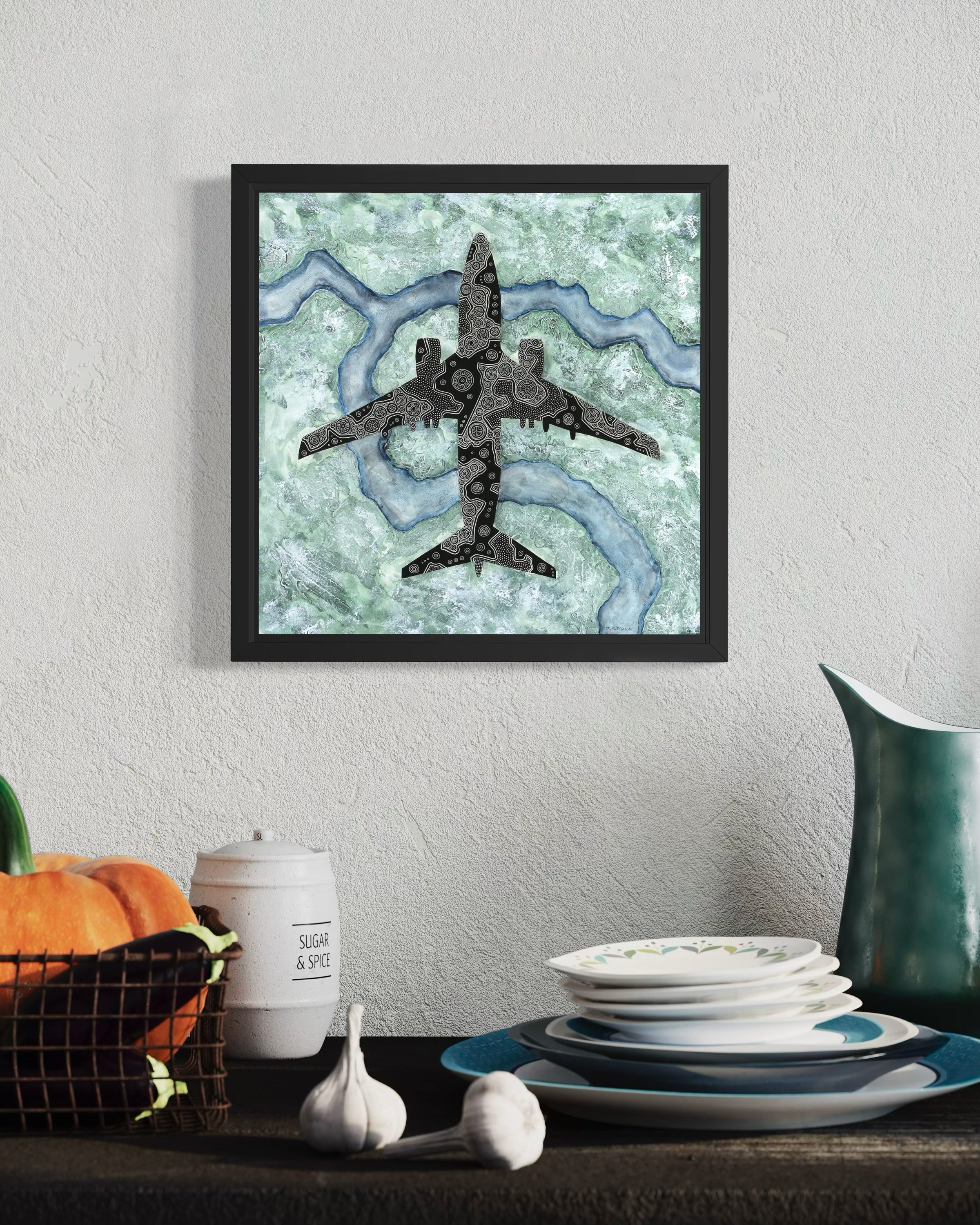 Top-down painting of a Boeing 737-800 with fine black linework over icy blue and white abstract winter terrain, artwork by MK Mason, interior mockup