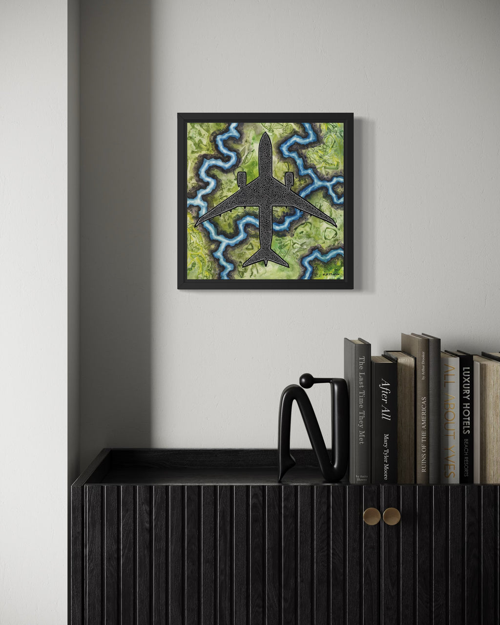 Top-down painting of a Boeing 787 with black-and-white abstract patterns over textured green and blue terrain, artwork by MK Mason, interior mockup