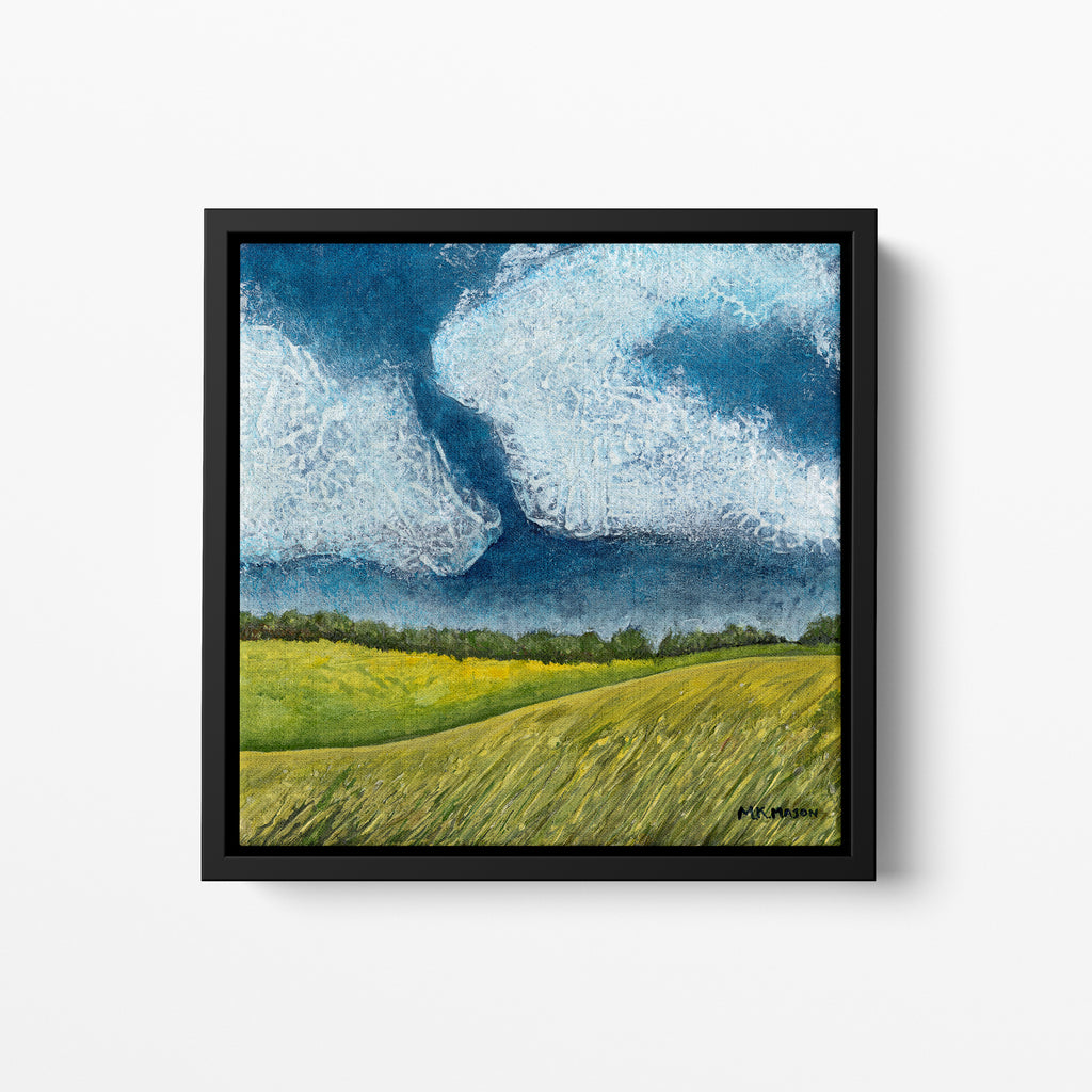 Acrylic landscape painting inspired by Stonehenge, with golden grass fields, dark blue textured sky, and soft white clouds, artwork by MK Mason, framed mockup